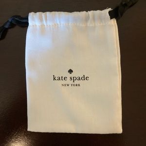 KATE SPADE medium white jewelry duster bag